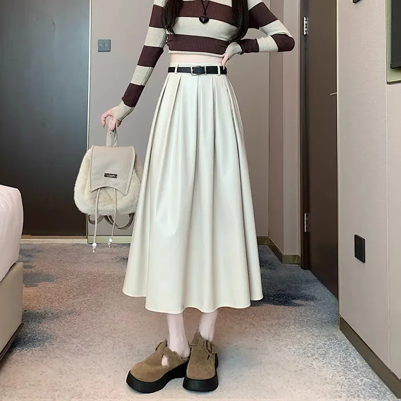 أسود فو بولي Leather جلد المرأة ألف خط التنانير 2026 جديد الخريف الشتاء عالية واسط الصلبة شيك مظلة مكتب التنانير الإناث #4