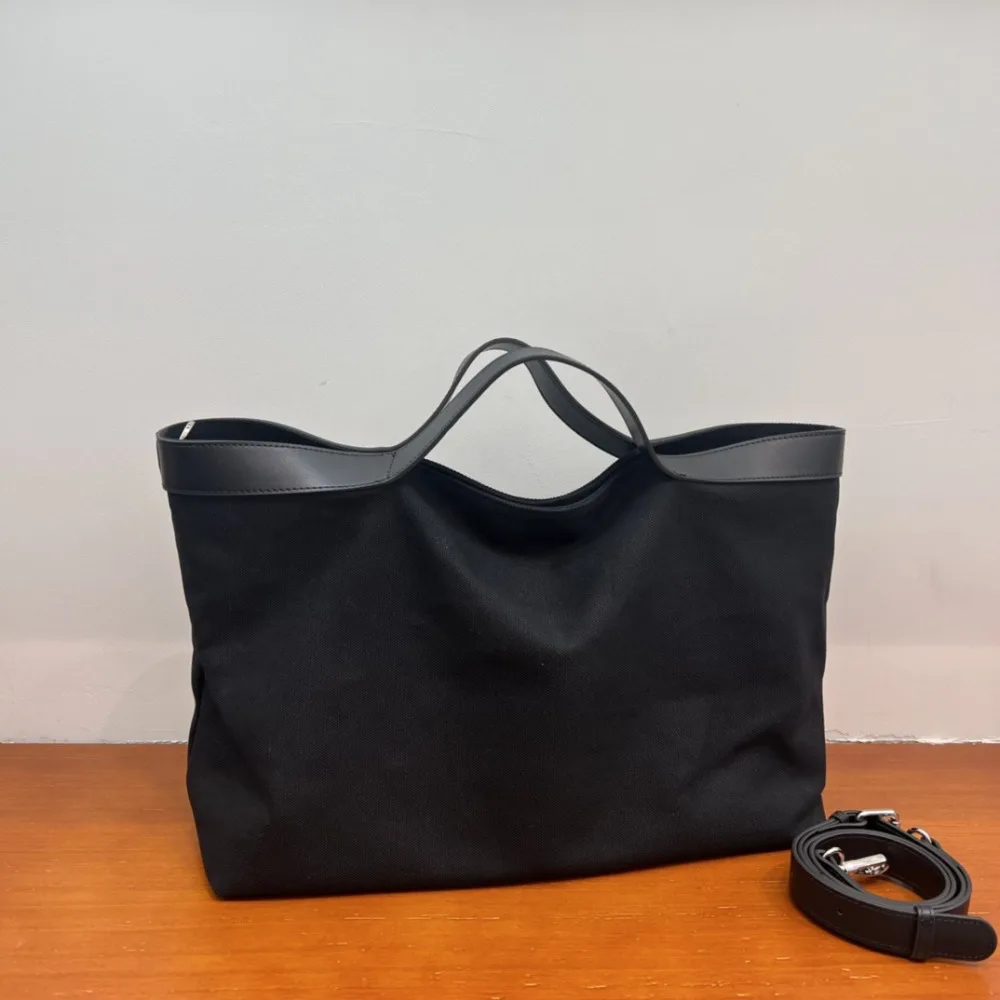 

Canvas Tote Bag 2026 New Commuter Texture Unique Fashion Versatile Premium Simple Computer Loose Lazy Tote Classic Elegance