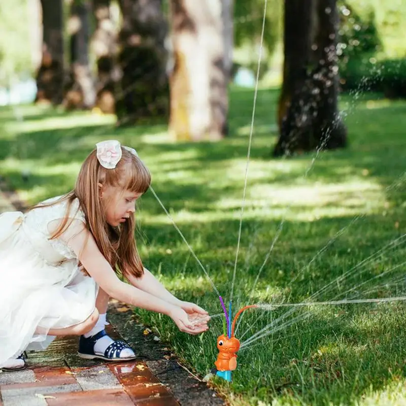 Wassers prinkler für Kinder Dinosaurier Wassers prüh sprinkler mit Rotations spray Spielzeug Hinterhofs piele für verspielten Sommer draußen