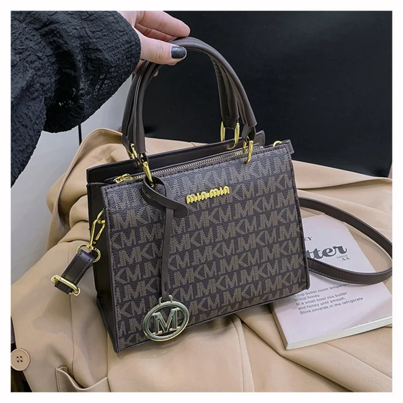 

Light Luxury Brand Letter Print Handbag with Letter Pendant Design Unique and Elegant Popular Fashion Niche High Quality