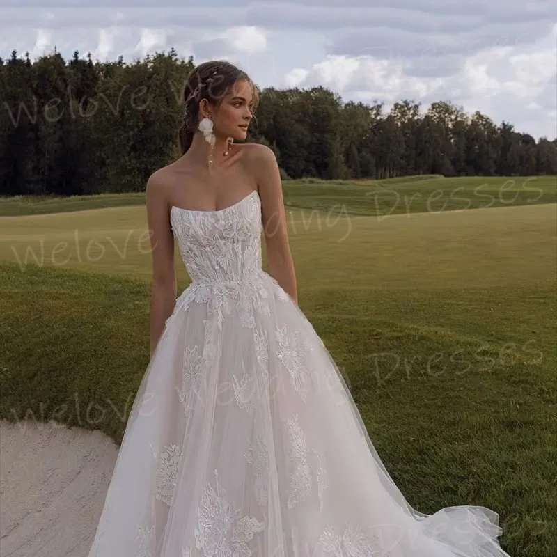 Prachtige A-lijn vrouwen Kant Applicaties Strapless Trouwjurken Robe De Mariée Aangepaste Backless Bruid Toga Vestido De Novia