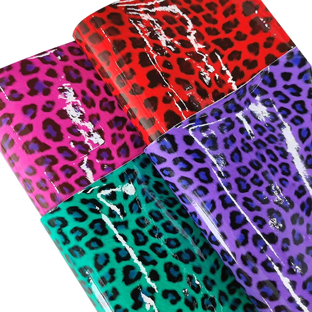 ผ้าหนังสังเคราะห์เรียบพิมพ์ลายเสือดาวสีสันสดใสสำหรับเย็บต่างหูโบว์กระเป๋าถือหนังเทียมมันวาวแบบทำมือ46*135ซม.
