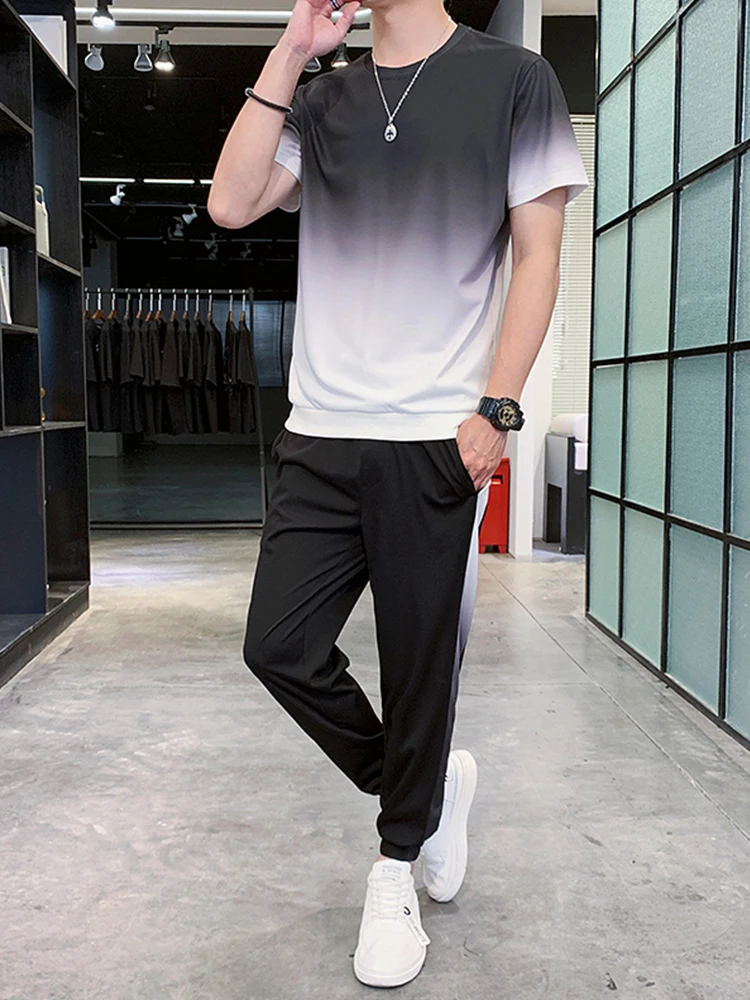 

Летний мужской модный повседневный спортивный комплект: стильная свободная одежда для мужчин, футболка с коротким рукавом и длинные брюки, комплект Haome