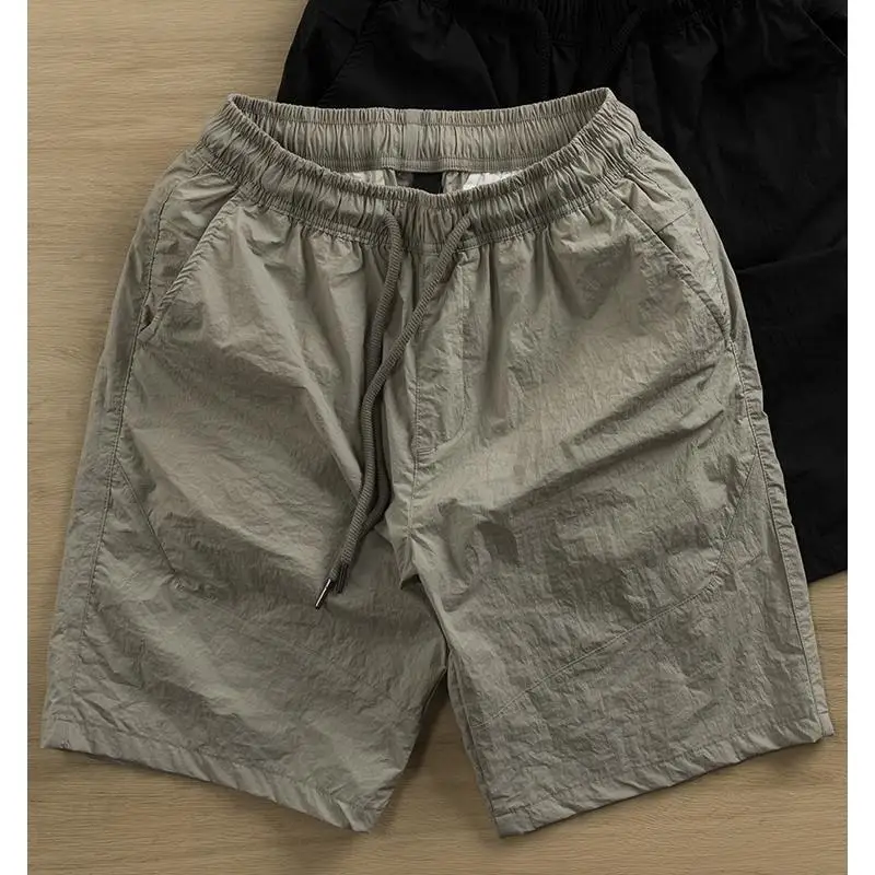 

Летние тонкие шорты из ледяного шелка, быстросохнущие, мужские, цветные, модные, слегка эластичные, удобные, повседневные, длиной до колена.