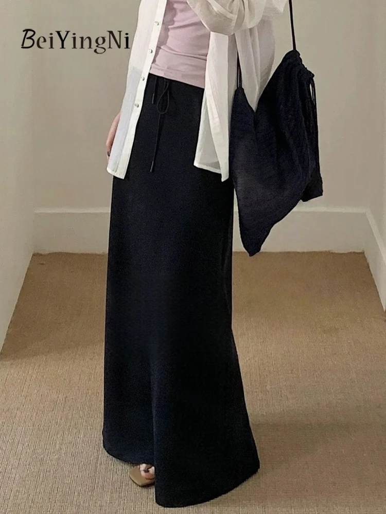 Beiyingni 2025 تنورة نسائية عصرية جديدة عادية سليم مرونة الخصر مستقيم سبليت ميدي التنانير الإناث عادية الكورية Faldas