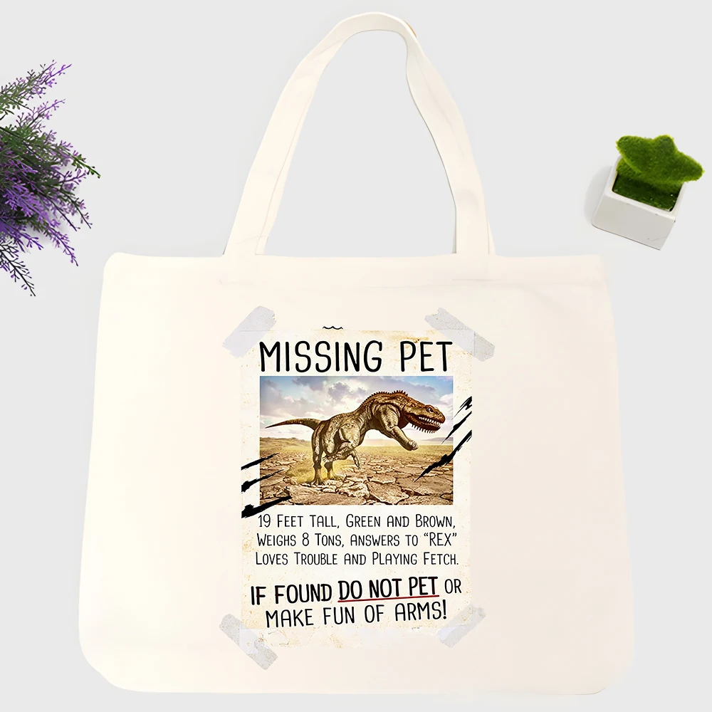 Men's dinosaur graphic canvas tote bag with typography print, ideal for casual daily use and weekend outings