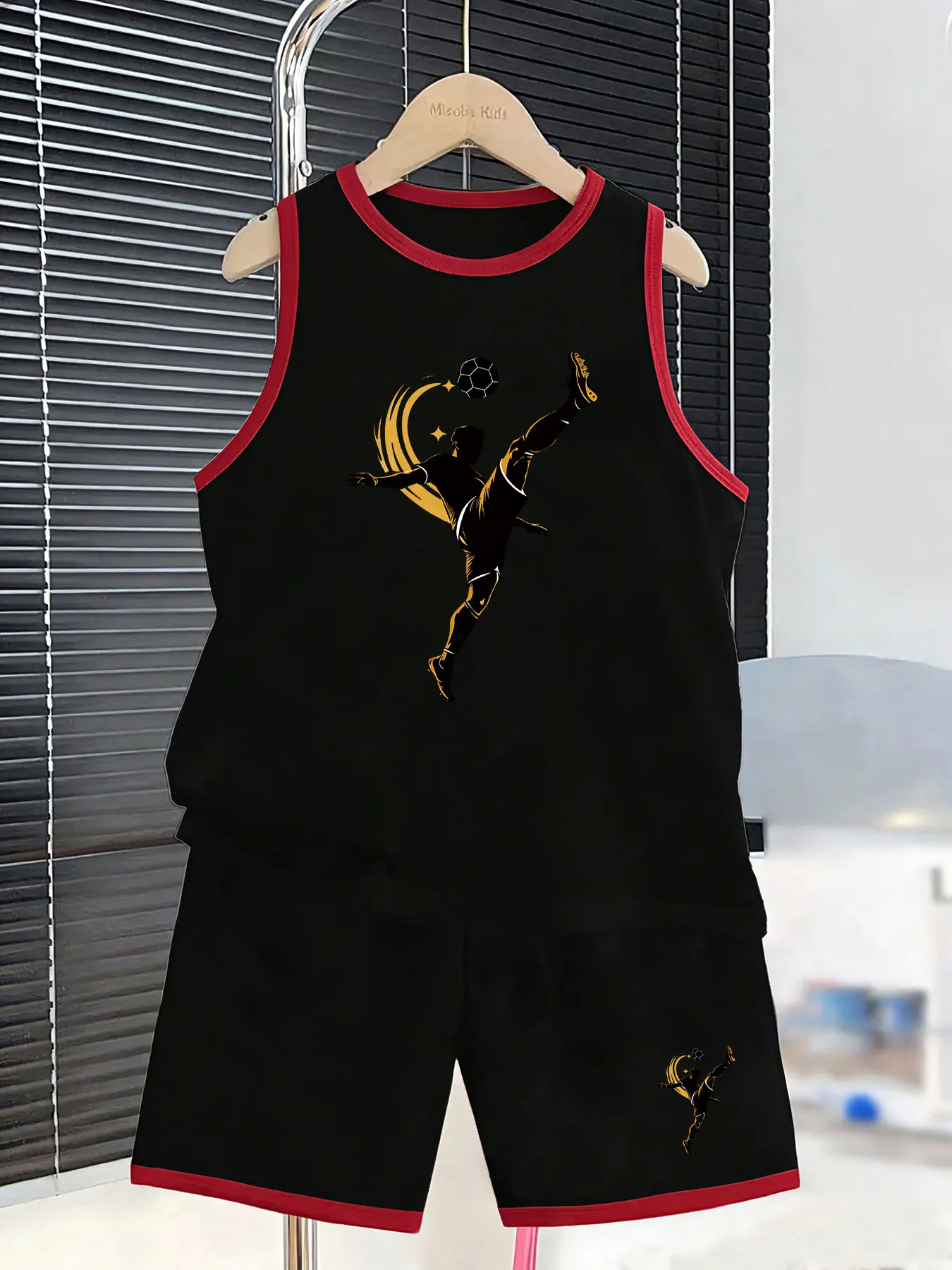 Cool Trendy Sports Tank Top and Shorts Set for Boys, featuring a trendy silhouette print of a boy kicking a ball with a hook sho