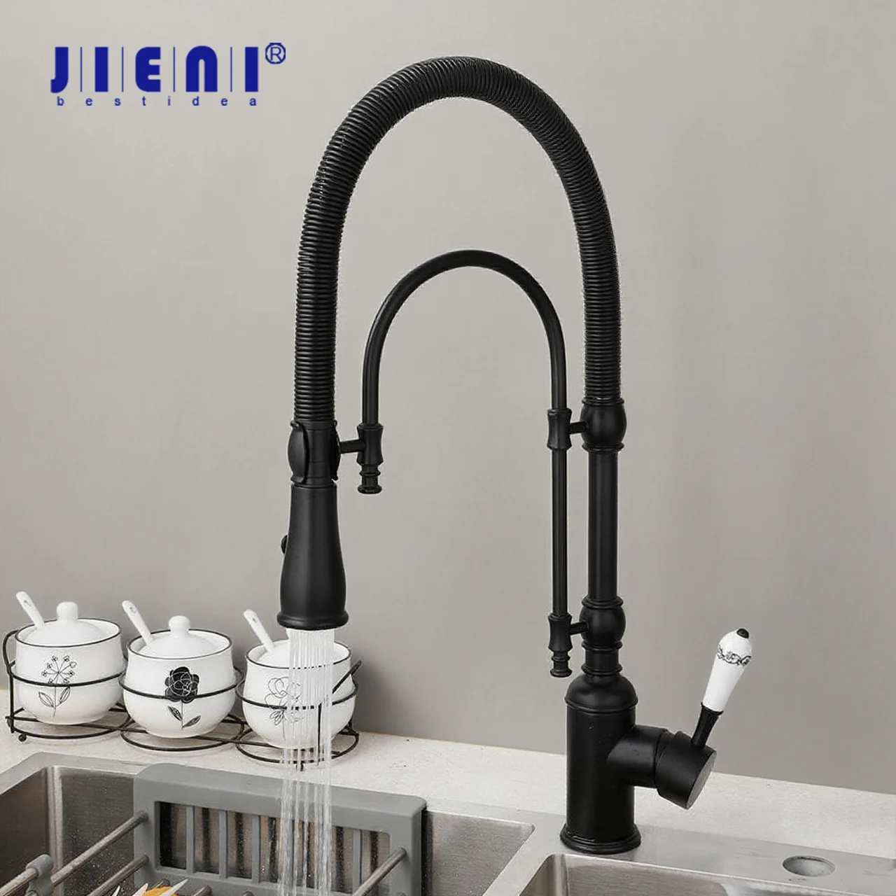 

JIENI Матовый черный кухонный смеситель, поворотный на 360 градусов смеситель для раковины с 2-ходовым пружинным распылением, смеситель для умывальника с горячей и холодной водой