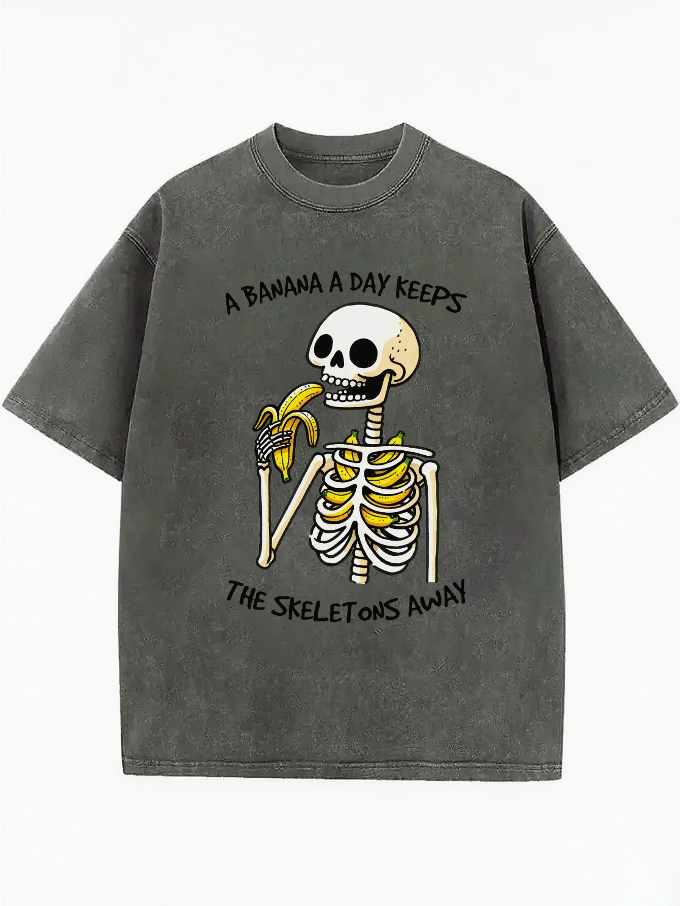 Esqueleto engraçado A BANANA A DAY KEEPS THE SKELETONS AWAY Camiseta feminina solta com gola redonda e lavada, adequada para todos os anos