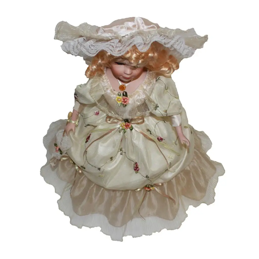 

Porcelain Doll 16 inch Standing With Beige Overlay Gown and Matching Hat With Lace Trimming