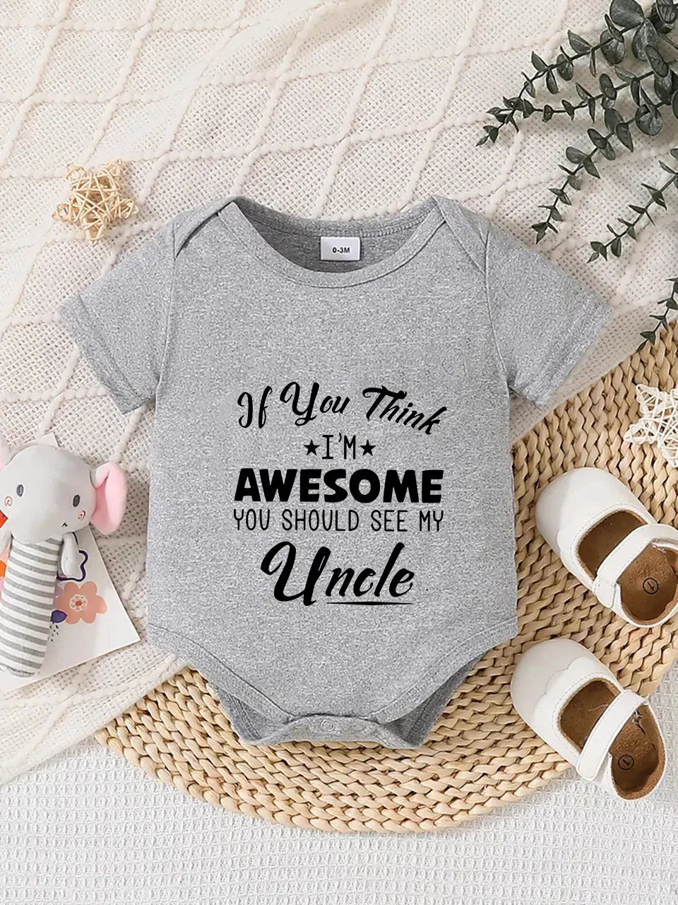 Baby short-sleeved triangle bodysuit, fun letter print, button design, easy to care for, suitable for new parents.