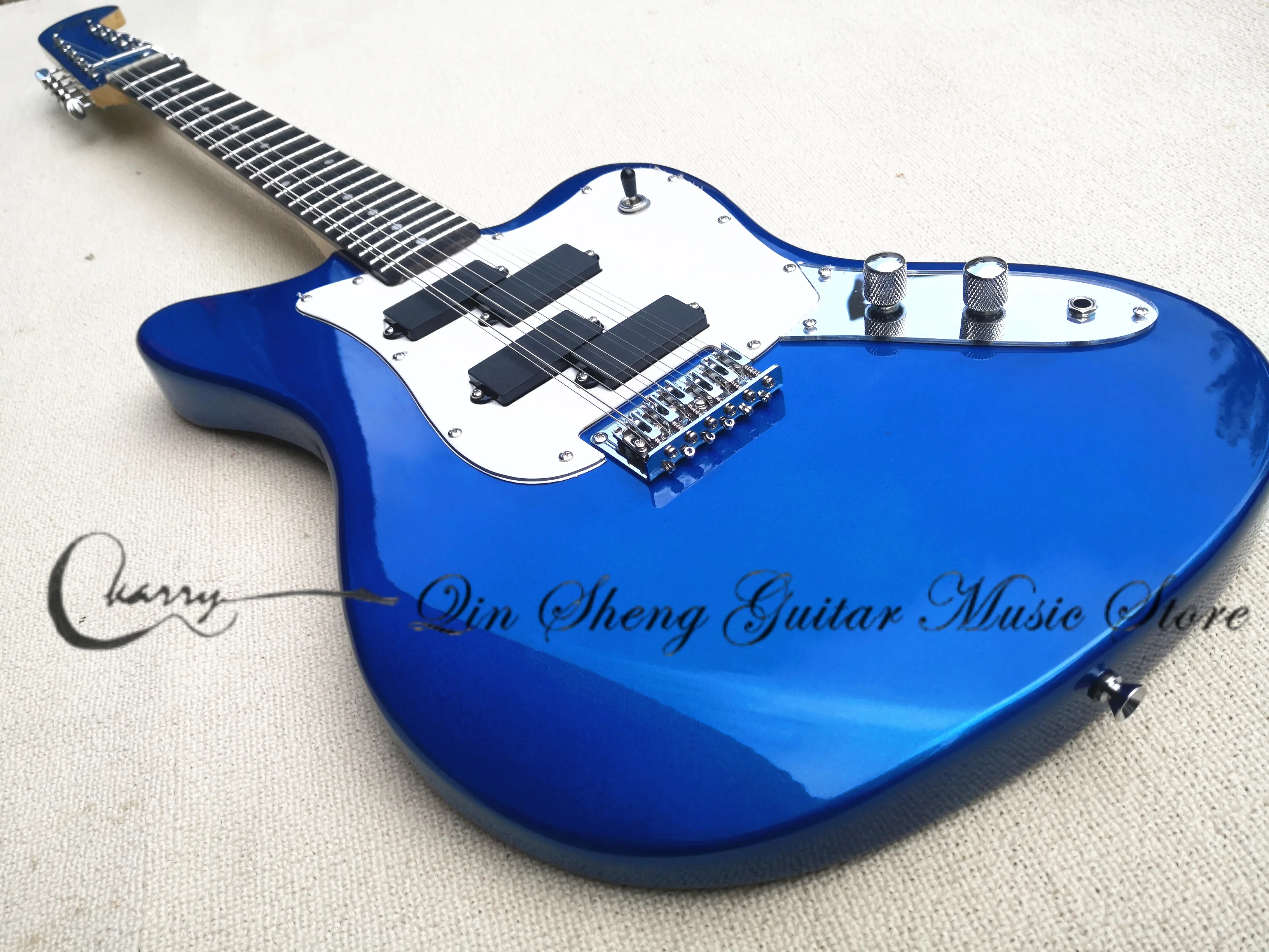 

Metallic blue guitar, 12-string electric guitar, rosewood fingerboard, maple neck, fixed bridge, white pickup board, vingate tun