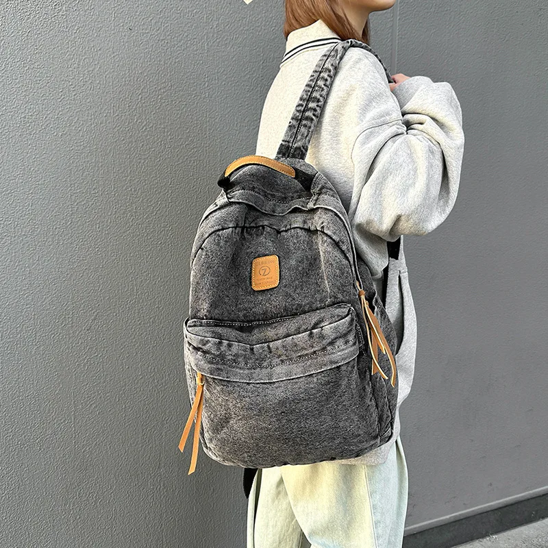 

Washed denim backpack for women 2025 new travel and leisure lightweight backpack commuting backpack for junior high school girls