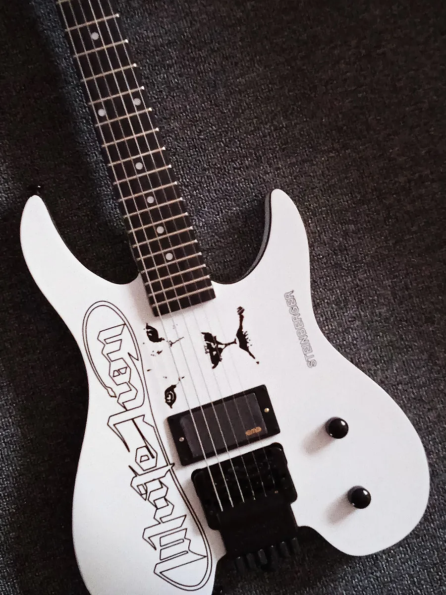 

Electric Guitar 6-String Lion White Headless, 648mm Scale Length, Mahogany Body, Maple Neck Fretboard