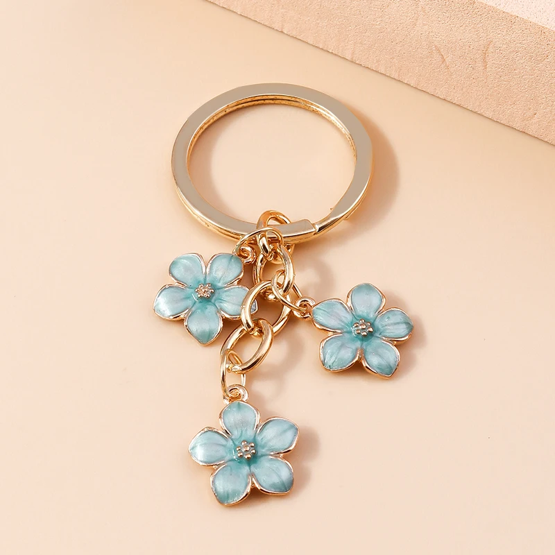 Aihua 40 Farben Niedlicher Pflanzen-Schlüsselanhänger Emaille Sakura-Blumen-Schlüsselanhänger für Frauen Mädchen Handtasche Anhänger Autoschlüsselhalter DIY Schmuck Geschenke – Detail 12