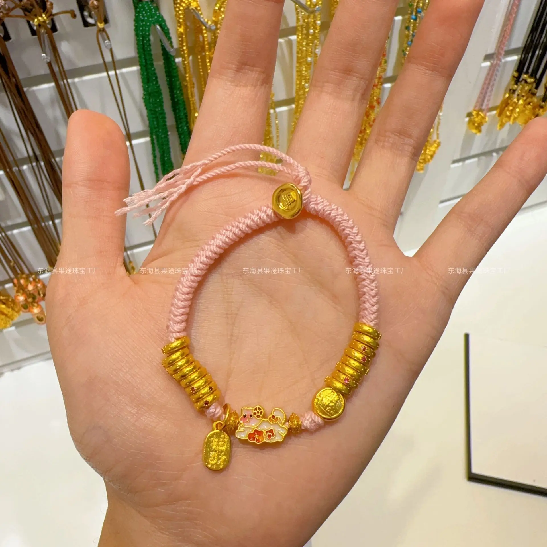 

Plated Genuine Gold Strong Preservation Ancient Sand Plate Wrapped With Pink Hand Rope To Attract Wealth And Fortune Girls Gift