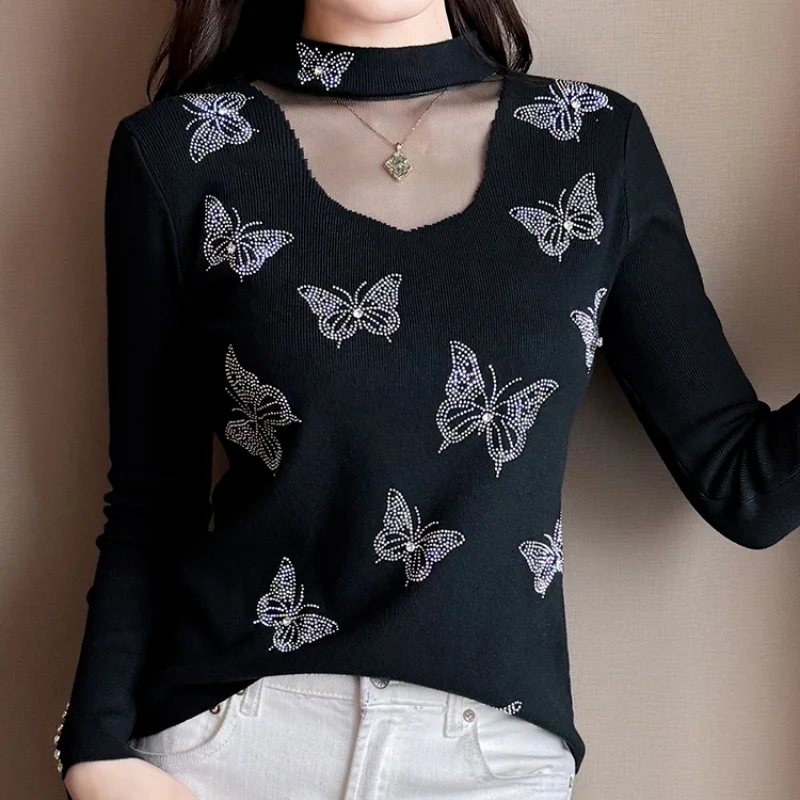 

Autumn Winter Long Sleeved Rhinestone Butterfly Knitted Shirt For Women New Sexy Hollow-Out Mesh Splicing High Collar Pullover