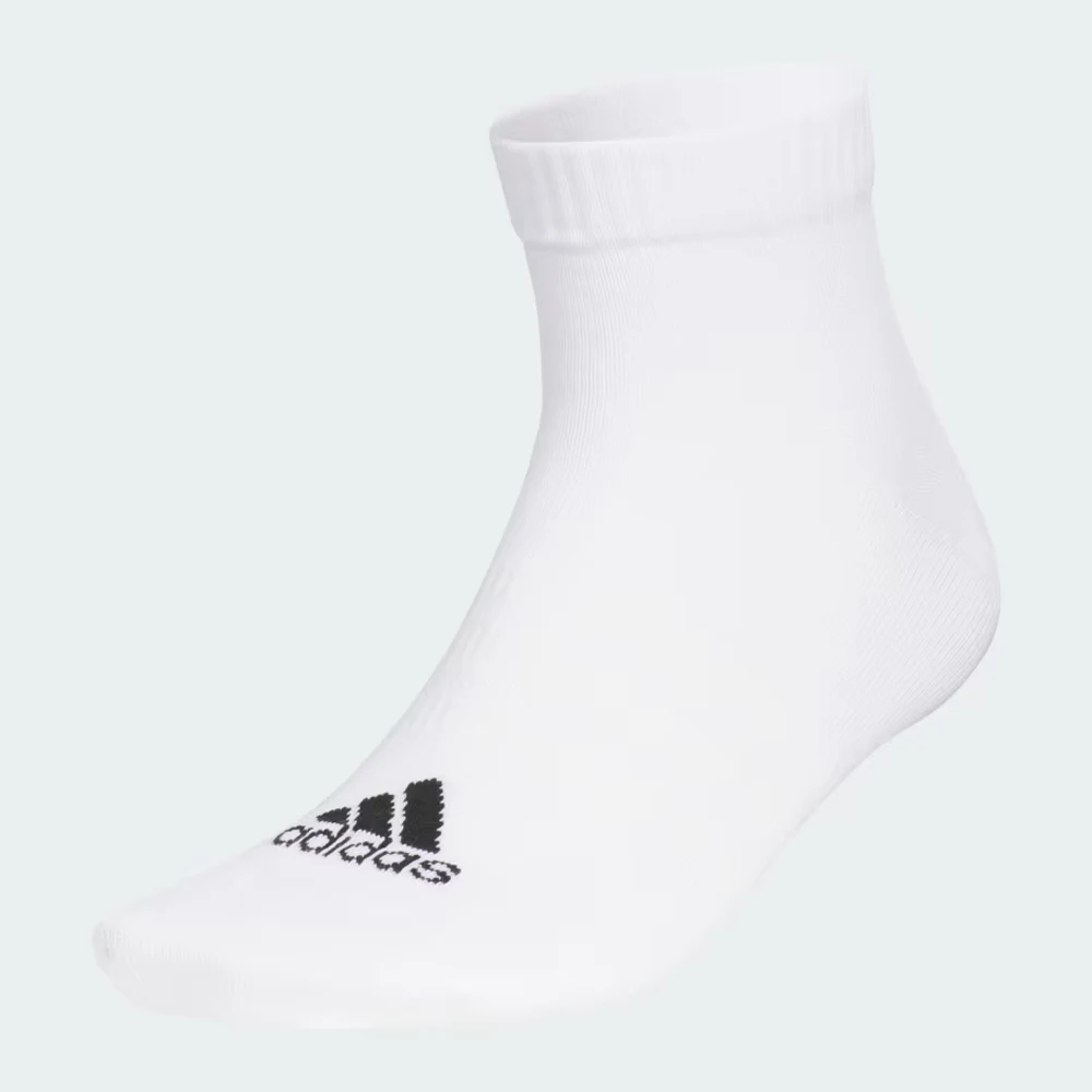 

Adidas Low — спортивные носки до щиколотки. Черный с белым логотипом, практичный для занятий спортом и на каждый день