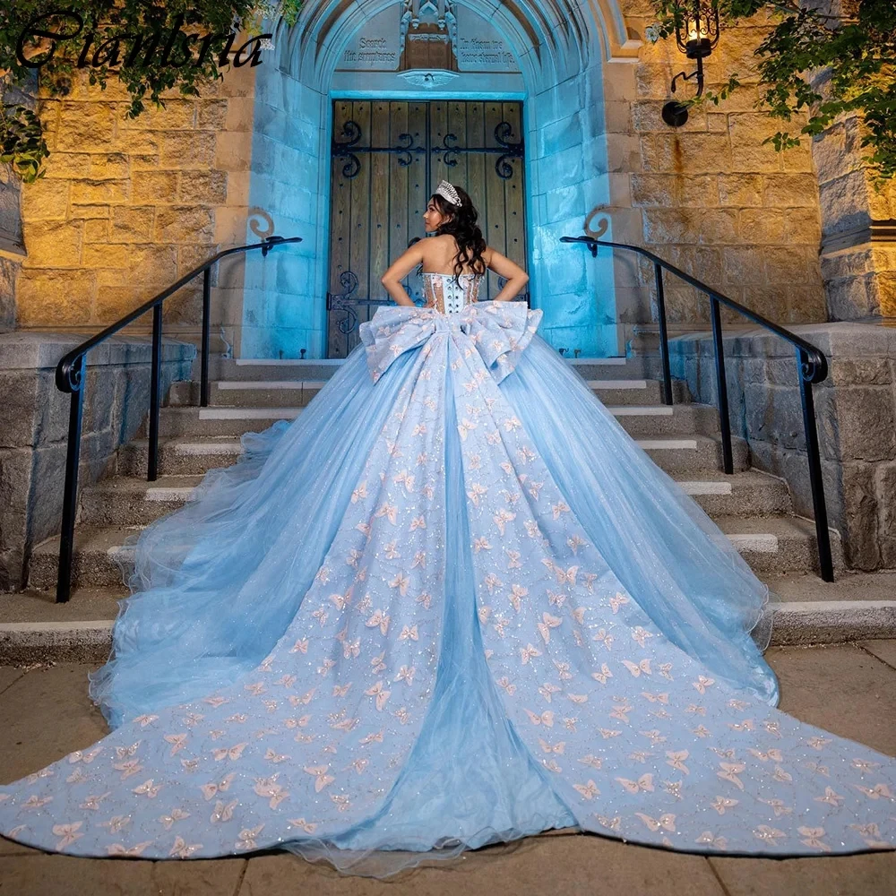 

Light Blue Illusion 3D Butterfly Bow Ball Gown Quinceanera Dresses Sweetheart Crystal Beading Corset Vestidos De 15 Años