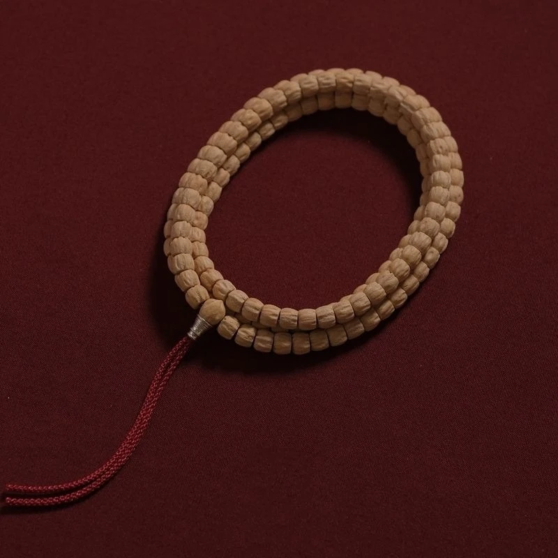 bracciale-passion-108-perle-di-semi-di-cipresso-heizhen-stile-tibetano-alta-densita-venature-lisce-fossette-profonde-motivo-a-faccia-di-fantasma