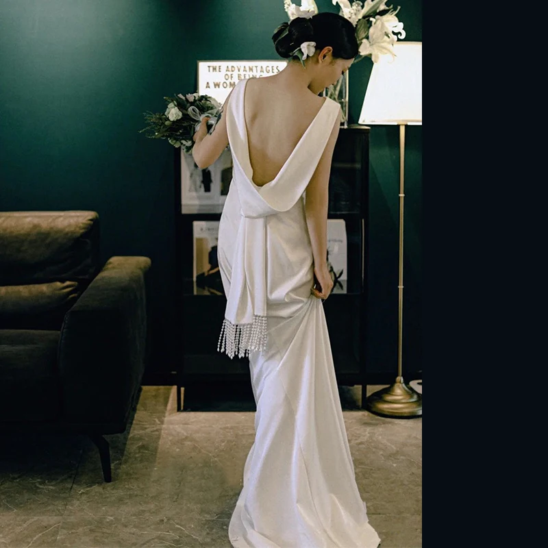 

Simple Elegant Backless Fish Tail Wedding Dress 2026 New Style Soft Satin Fabric Outdoor Lawn Wedding Dress with Pearl Detail