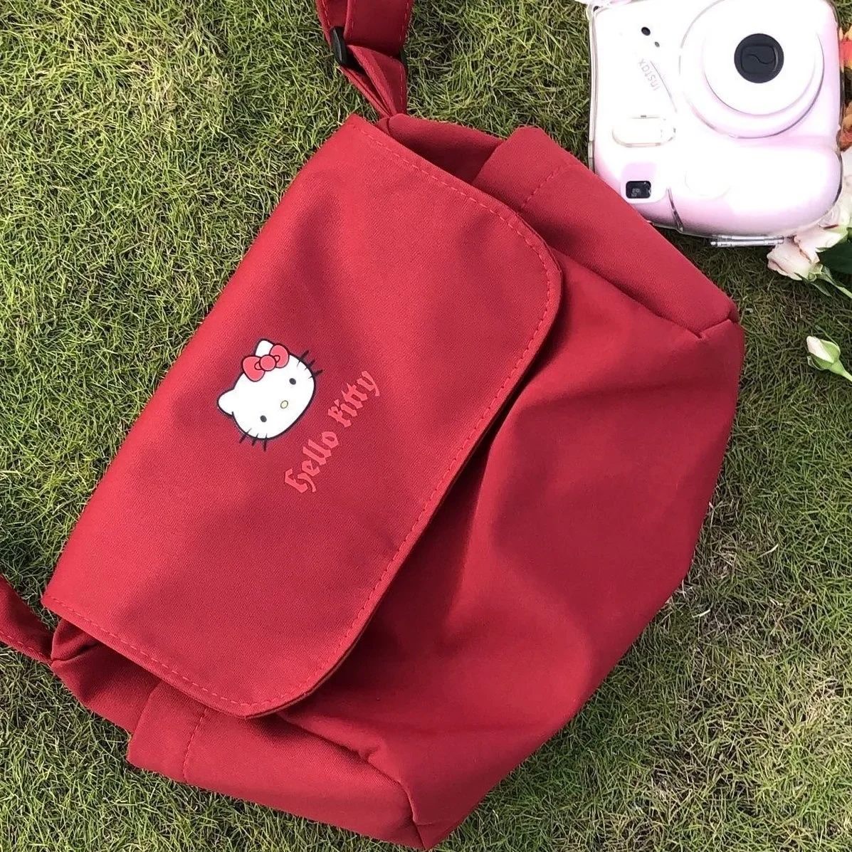 Sanrio Serie Hallo Kitty Rucksack lässig Kitty Umhängetasche College-Stil einfache rote Cartoon Umhängetasche Frauen Reisetasche