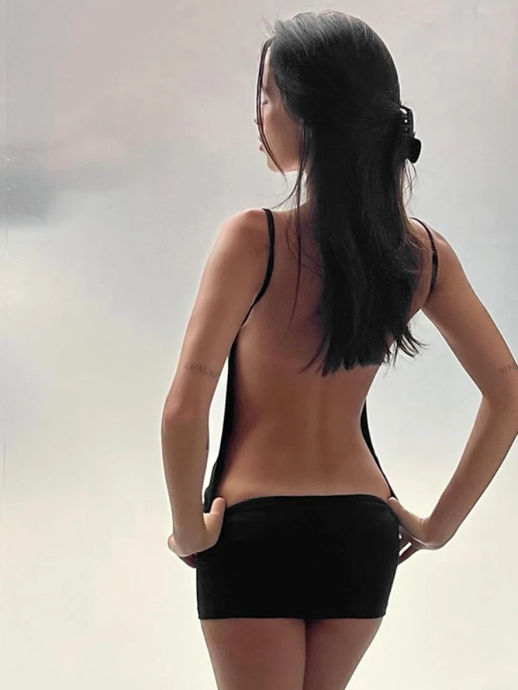 Mulher roupas sem costas sem mangas festa clube vestido 2026 chique sexy cinta de espaguete oco para fora magro mini vestidos pretos streetwear