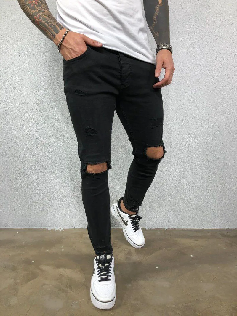 Jeans da uomo nero blu fresco Skinny foro al ginocchio strappato Stretch Slim pantaloni in Denim elastico tinta unita pantaloni stile High Street uomo