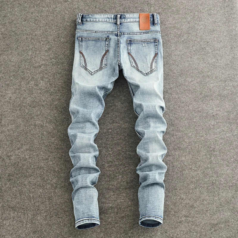 Designer Fashion Men Jeans High Quality Retro Light Blue Stretch Slim Fit Painted Ripped Jeans Men Vintage Denim Pants Hombre