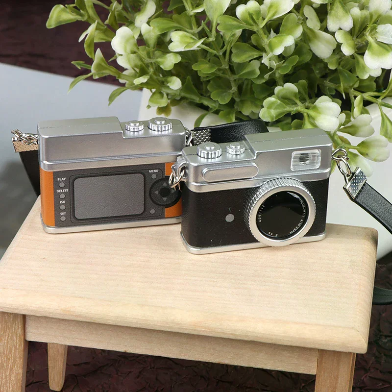 

1Pc Mini Camera Model Dollhouse Miniature Retro Camera Model Decor Toy Can Shine