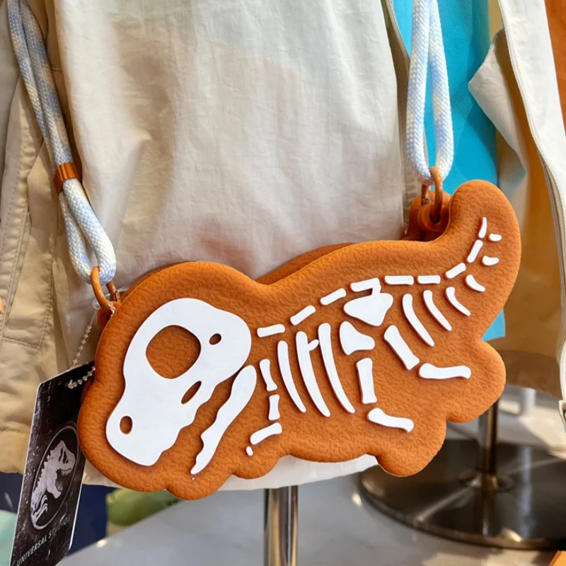 

New Genuine Universal Studios Skeleton Fossil Dinosaur Crossbody Backpack Shoulder Bag Silicone Crossbody Bag Souvenir Gift