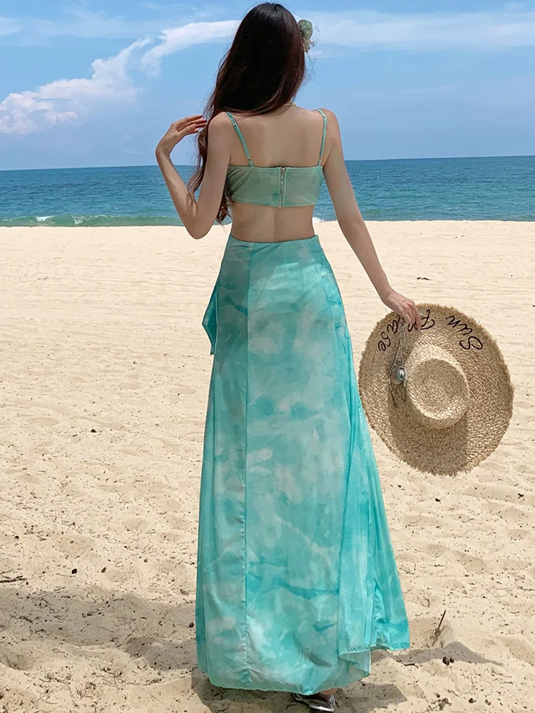 ฤดูร้อนสีเขียวตาข่ายพิมพ์ Hollow OUT ชุดผู้หญิงโบว์ลูกไม้สแควร์เซ็กซี่ชุดสลิง 2025 ใหม่เกาหลีสไตล์ชายหาดชุด