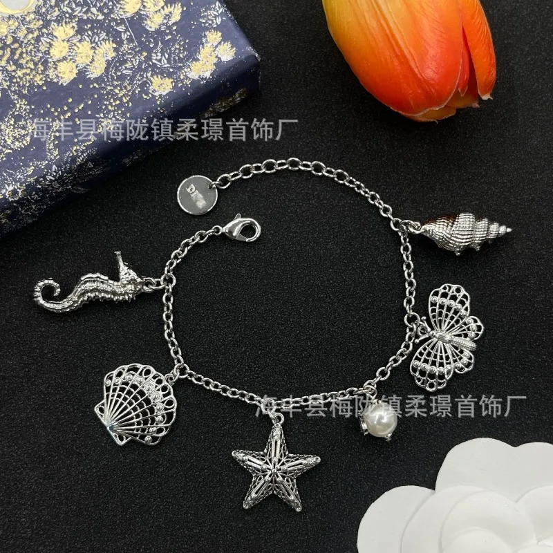 Dijia سوار جديد المحيط نمط اللؤلؤ نجم البحر شل قلادة قلادة مبالغ فيها أزياء المرأة سوار المرأة