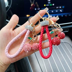 Creative alloy diamond inlaid fruit cherry car keychain fashion with diamond woven rope personalized bag decoration pendant gift