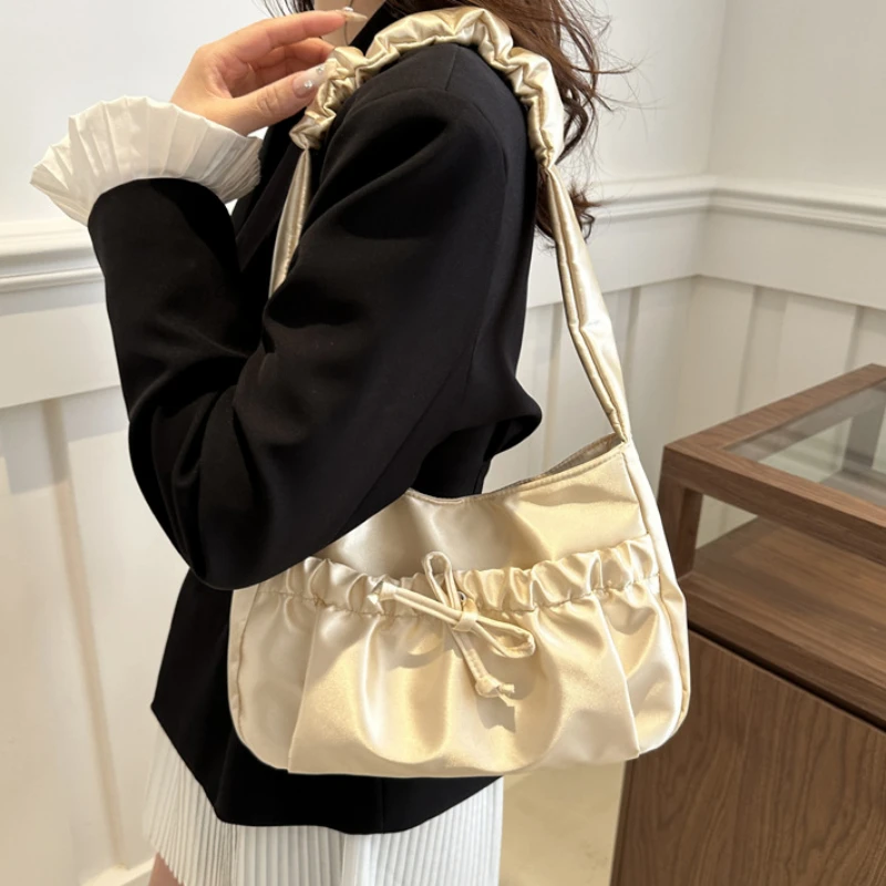 New Western style Sweet Girl Shoulder Bag Fashionable Bow Fold Bag Luxury Designer High end Commuting Underarm Bag