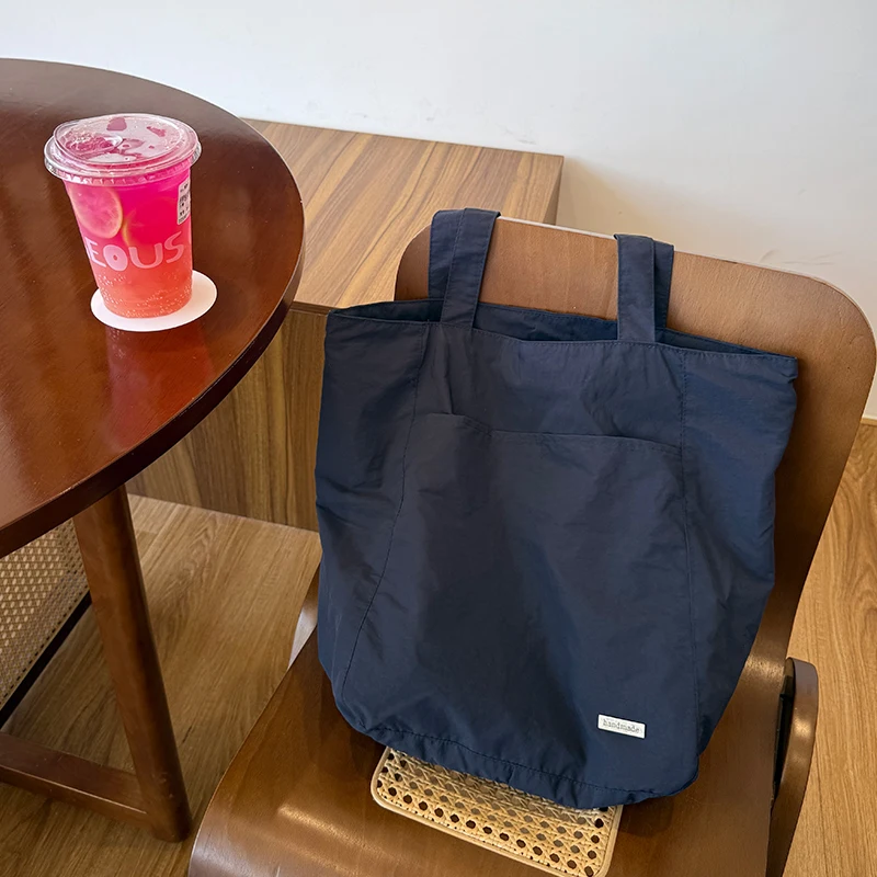 nova-bolsa-de-ombro-em-nylon-ande-capacidade-com-dois-bolsos-estilo-simples-e-moderno-bolsa-de-lona-para-uso-casual-juv