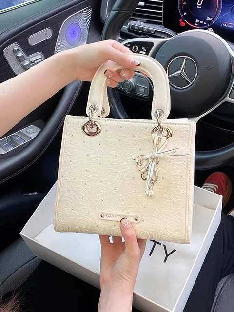 

Popular and Luxury Princess Diana Bag with Charming Decoration and Pendant Women's Stylish Versatile Handheld Crossbody Bag