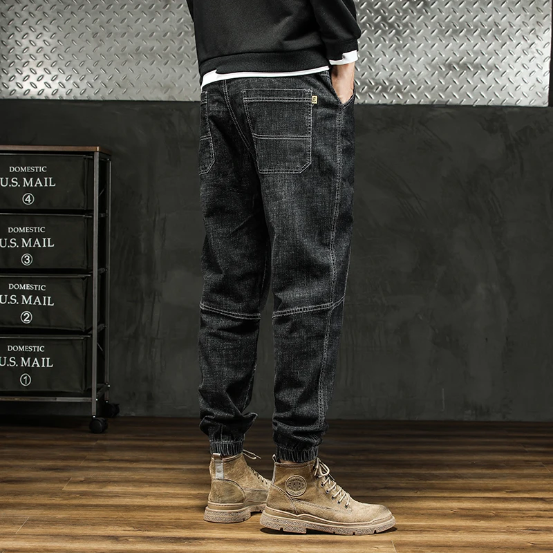 رجل في الهواء الطلق البضائع نمط مدبب الدينيم الجينز 2025 الخريف الشتاء الرباط مكبل تصميم سراويل تقليدية حجم كبير 5XL #4