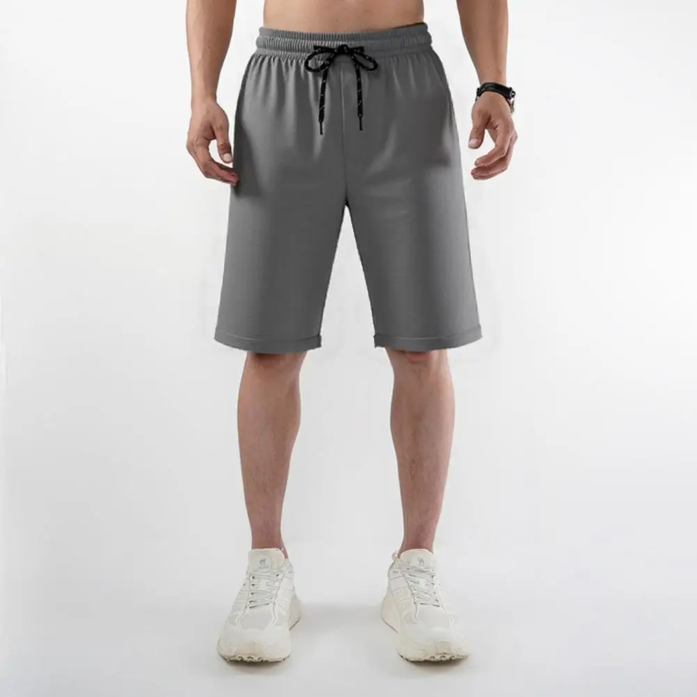 

Men Shorts Elastic Waist Adjustable Drawstring Wide Leg Shorts With Pockets Solid Color Beach Casual Shorts Summer Male Clothes
