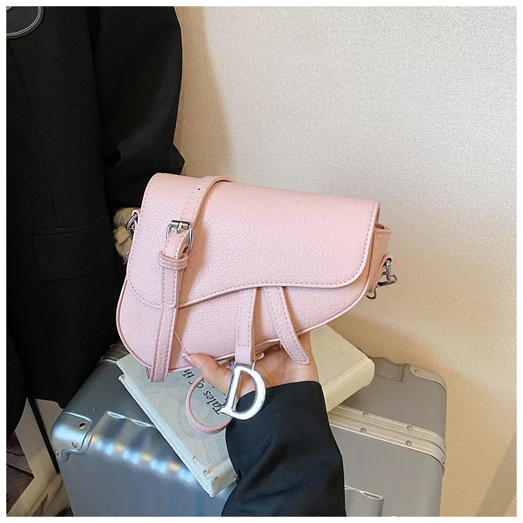 Venda quente nova bolsa de sela de luxo-design retrô e de nicho, estética sofisticada, bolsa crossbody/ombro moderna para mulheres,