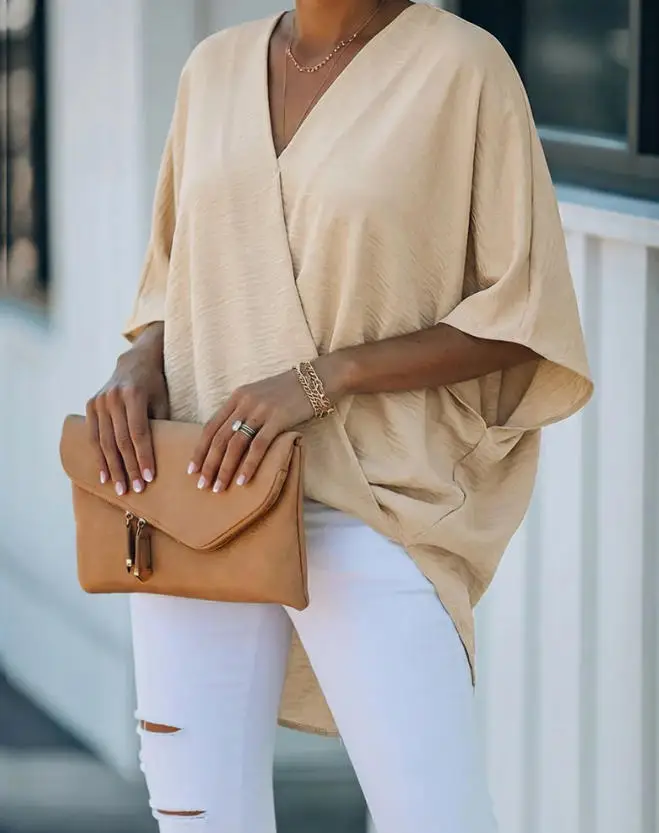 

French Classic Fashion Temperament Style Solid Color Simple Overlapping V-Neck Bat Sleeve Design Loose Women's Long Sleeved Top