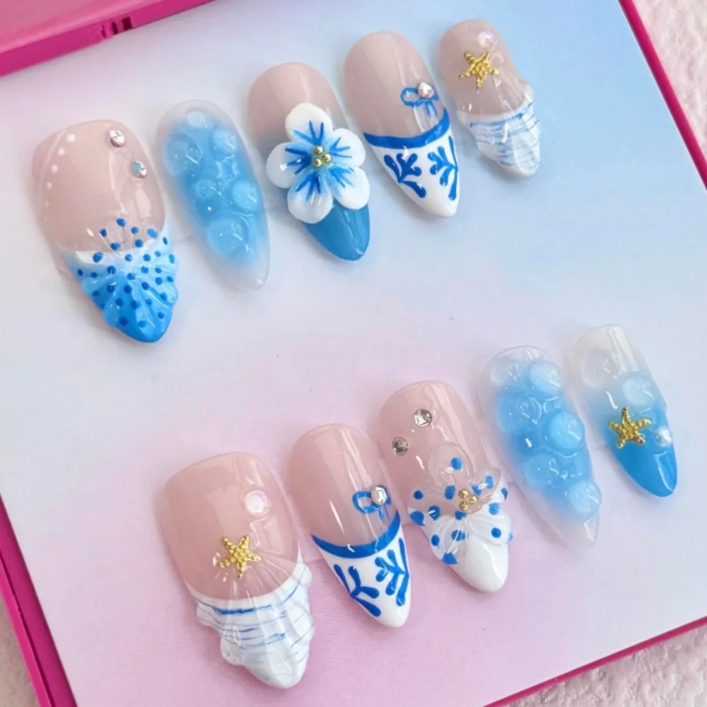 

24pcs hot selling three-dimensional carved blue nail art, wearing nail art, high-end feeling, almond shaped pearl French fake nail art