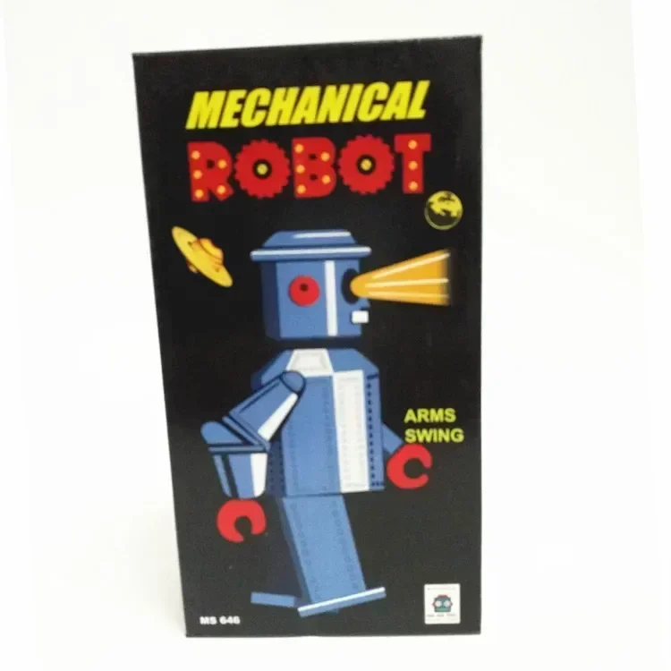 

Retro wind-up metal tin toy featuring a swinging-arm alien robot alike mechanical clockwork figure fun and nostalgic kids gift