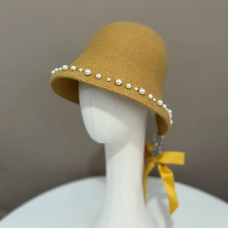 

Unique design Japanese back split pearl bow woolen fisherman hat delicate and elegant women's holiday fashion hat