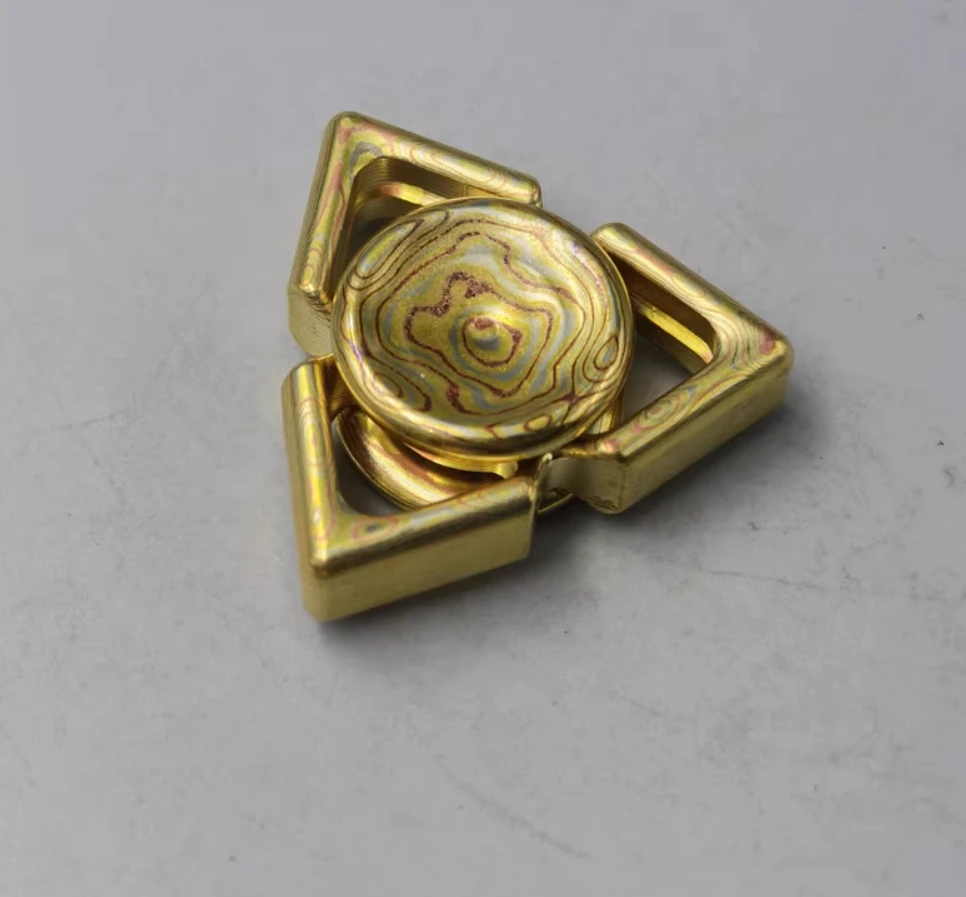 Używany spinner EDC Linglong Mokume, zabawka antystresowa.