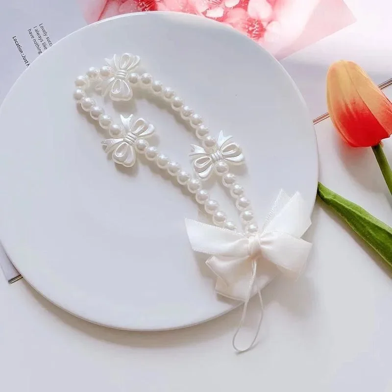 سلسلة هاتف لؤلؤية على شكل قلب مع فيونكة بيضاء من كوريا للنساء والفتيات حبل مطرز للهاتف إكسسوارات مضادة للفقدان هدية مجوهرات السيارة - 2