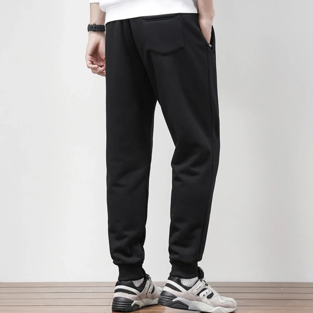 Pantaloni termici durevoli e caldi in lana d'agnello invernale da uomo con coulisse per pantaloni sportivi da jogging fitness