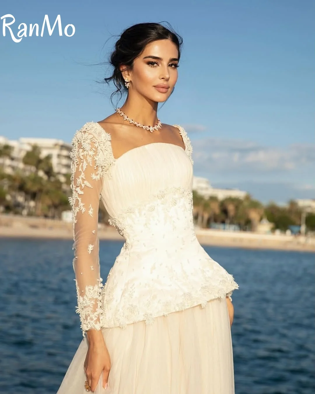 Ranmo 2025 فساتين زفاف رائعة بأكمام كاملة للنساء على شكل حرف a زي العرائس دانتيل لؤلؤ طول الأرض مخصصة فيستدوس دي نوفيا
