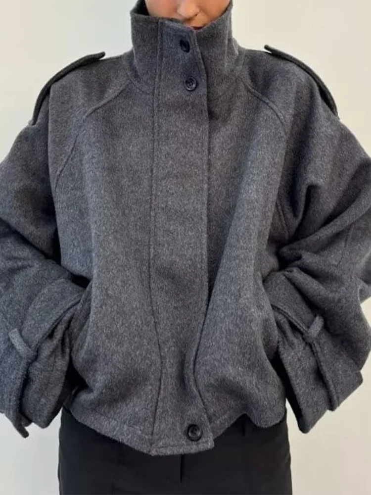 

Новое женское модное и универсальное однотонное шерстяное пальто с длинными рукавами и воротником-стойкой в европейском стиле.