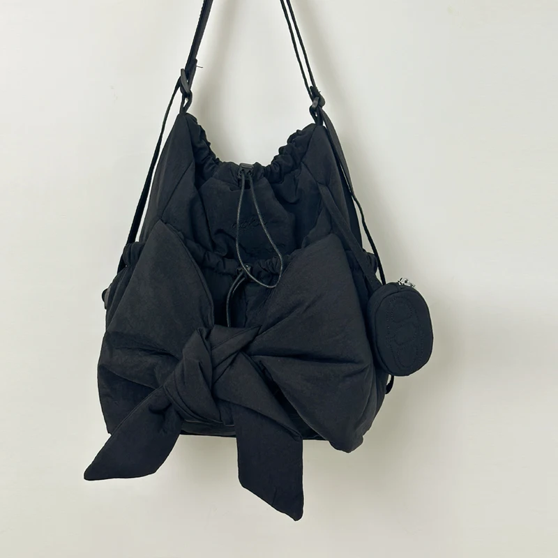 المرأة حقيبة كتف بسيطة سعة كبيرة القوس الرباط على ظهره بلون حقيبة ظهر عادية السيدات حقيبة السفر